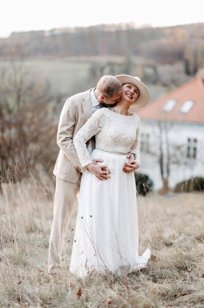 a man and woman in a field