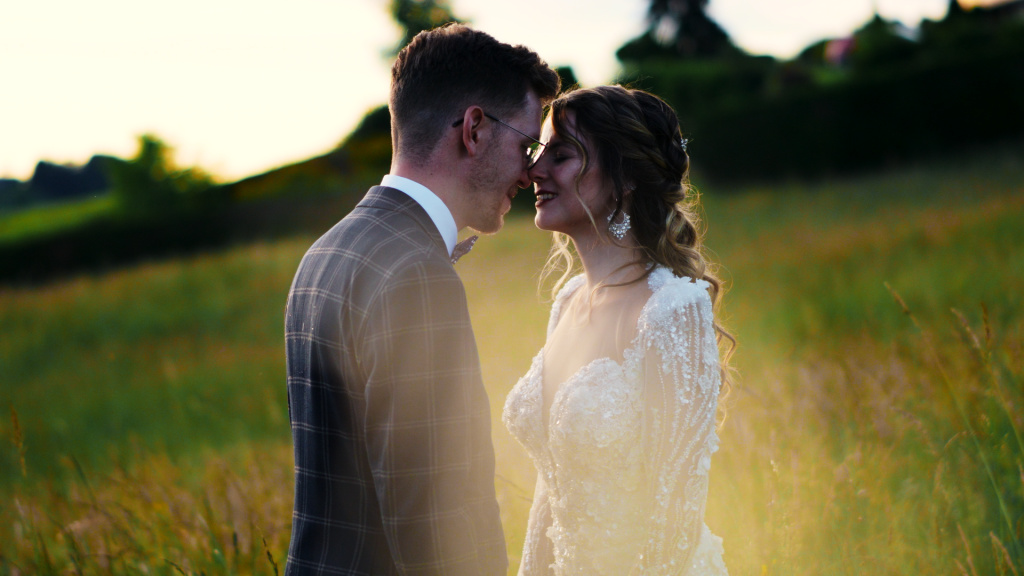 a man and woman in a field